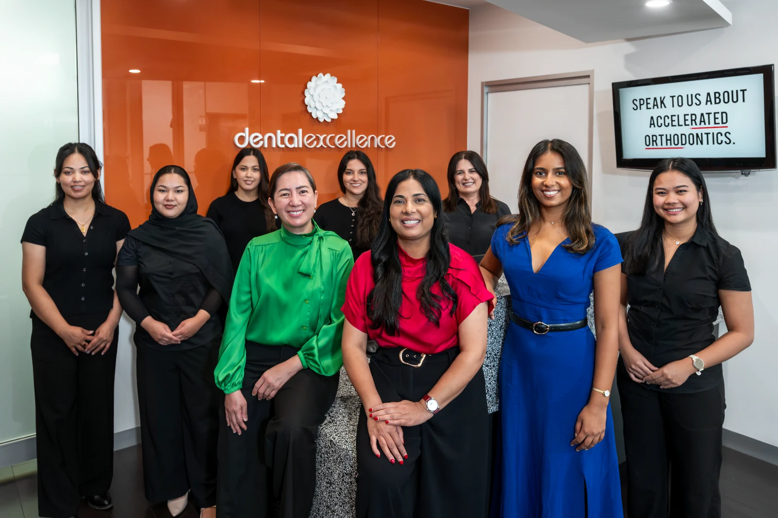 The Dental Excellence team standing together at reception