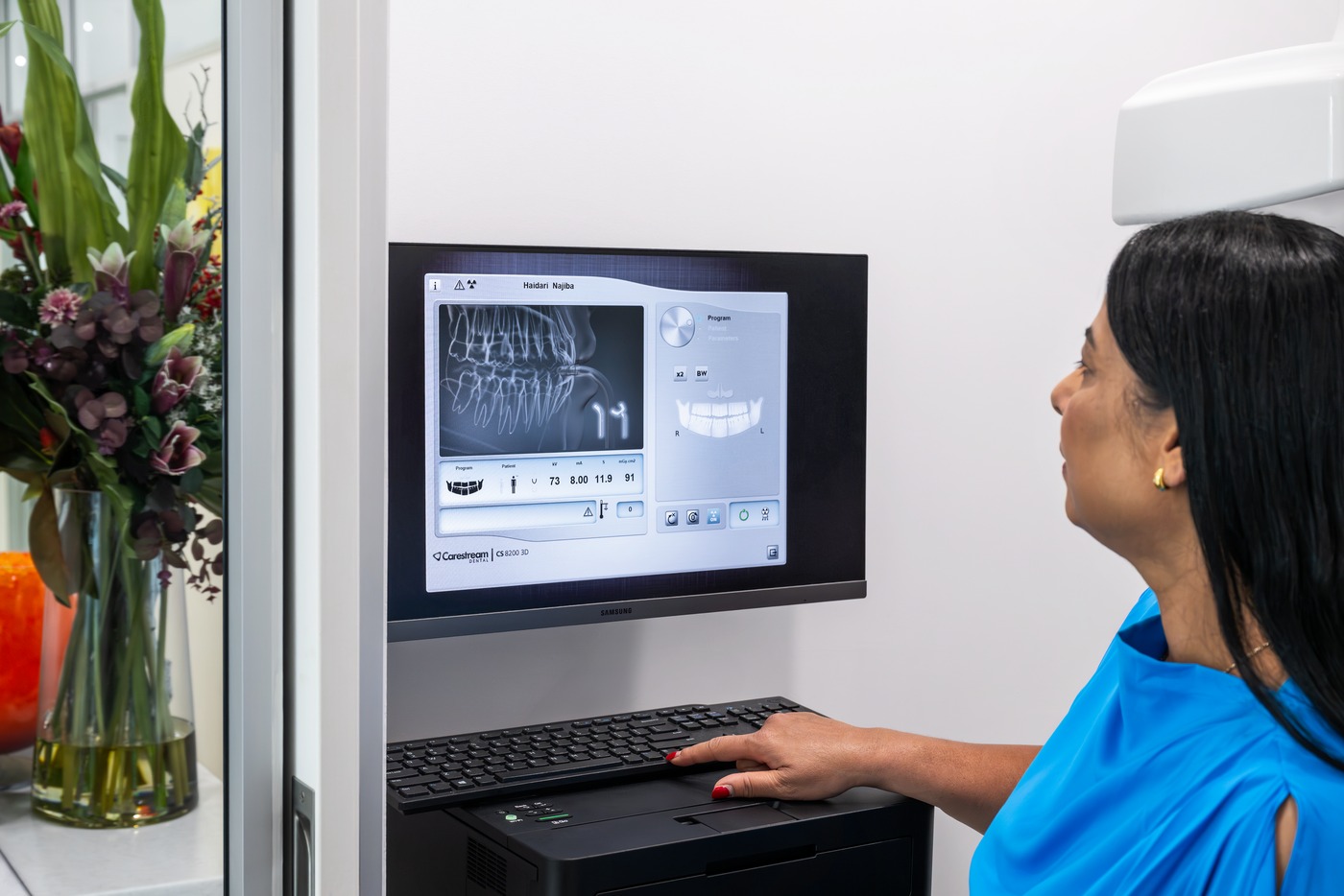 A digital imaging screen showing a dental scan in the clinic